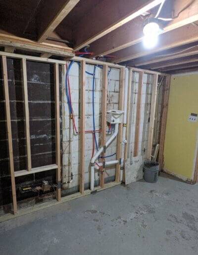 old basement with exposed drywall