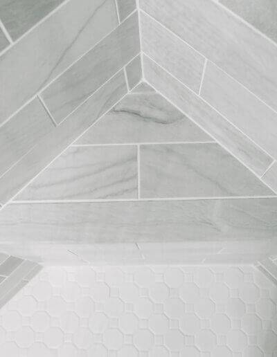 Shower foothold in corner made of tile